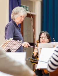 Carol, Musical Director and Conductor